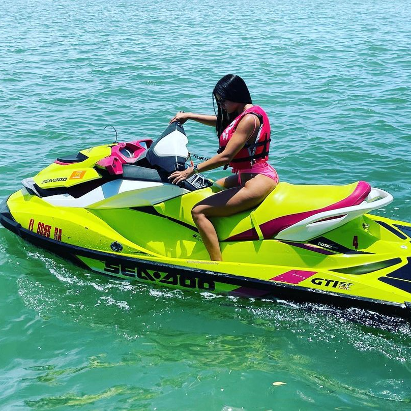 Woman on the yellow jet ski